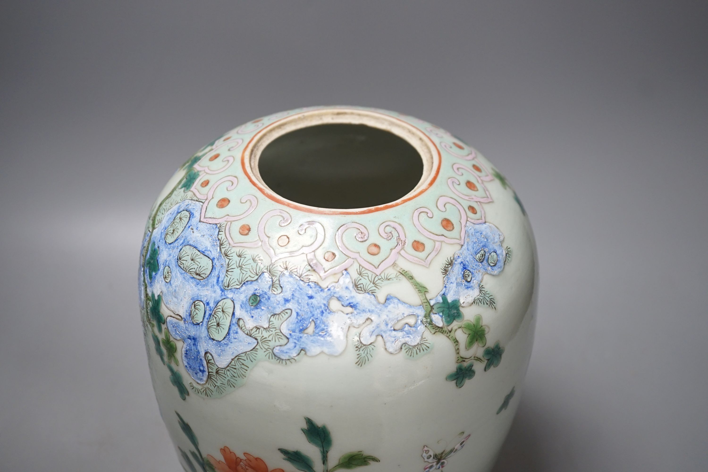 A Chinese Straits famille rose ‘phoenix’ jar and Hongmu cover, 30 cms high including cover.